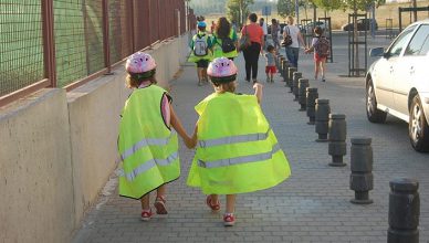 Students with helmets and vests